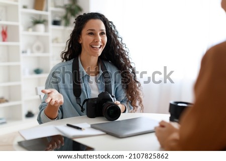 Female Photographer Having Job Interview Talking To Employer Lady Sitting In Modern Office. Photography Career And Education Concept. Selective Focus