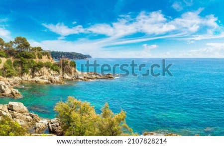 Panorama of Rocks on the coast of Lloret de Mar in a beautiful summer day, Costa Brava, 

Catalonia, Spain Royalty-Free Stock Photo #2107828214