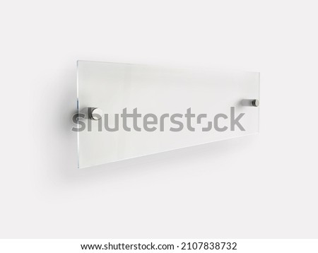 Clear wide rectangle Transparent glass nameplate plate on spacer metal holders. Clear printing board for branding. Acrilic advertising signboard on white background mock-up side view. 