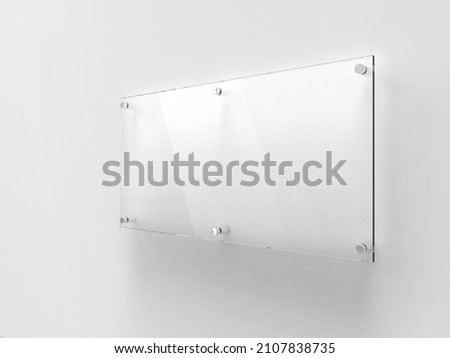 Transparent wide glass nameplate on spacer metal holders. Clear printing board for branding. Acrylic advertising signboard on white background mock-up side view. Size 500 x 250 mm. 3D illustration Royalty-Free Stock Photo #2107838735