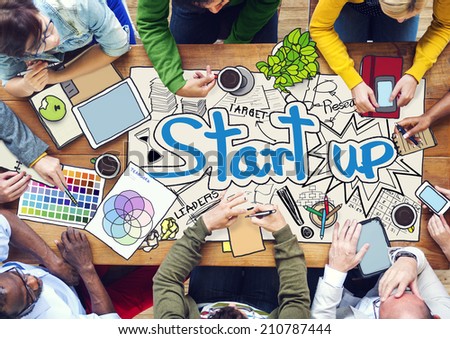 People Working with Photo Illustrations of Startup Business Royalty-Free Stock Photo #210787444