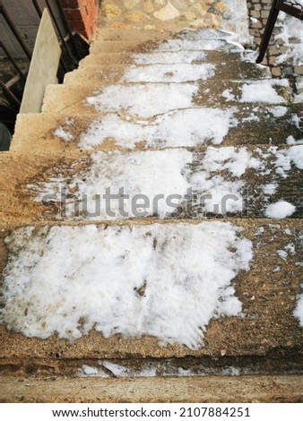 Danger Frozen Steps. Ice Covered Slippery Concrete Stair 