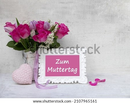 Mother's Day card: bouquet of roses and picture frame with the text Mother's Day.