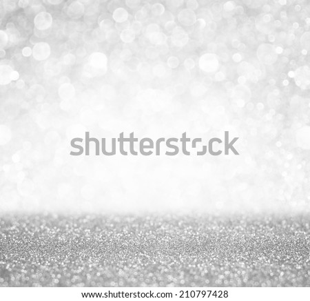 silver and white bokeh lights defocused. abstract background Royalty-Free Stock Photo #210797428