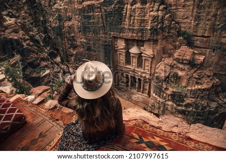 Girl at the wonder of the world Petra in Jordan Royalty-Free Stock Photo #2107997615