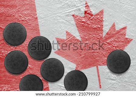 Washers and the image of the Canadian flag on a hockey rink