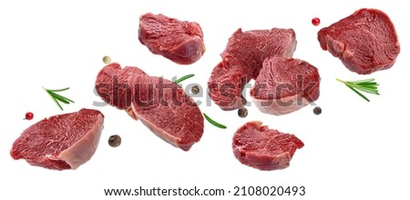 Falling raw beef meat isolated on white background Royalty-Free Stock Photo #2108020493