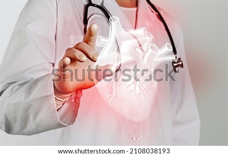 A doctor touches virtual Heart in hand. Healthcare hospital service concept Royalty-Free Stock Photo #2108038193