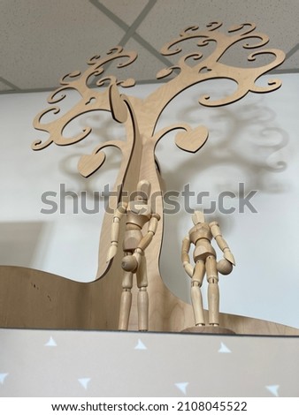 Decorative wonderful image natural background made of natural wooden objects composition in front of white wall .