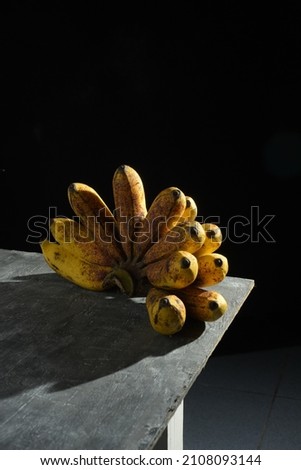 Bananas are placed on the table. Selective focus