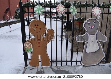 Christmas decorations on a fence
