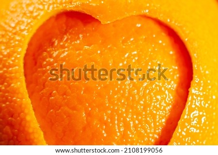 Orange with a cut heart on Valentine's Day.
