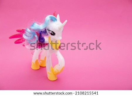 BOBRUISK, BELARUS 20.11.21: Action figure from the cartoon princess celestia on a pink background. My little poni