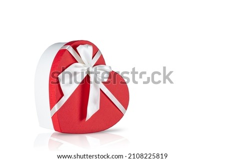 Gift box in the shape of a heart on a isolated white background.