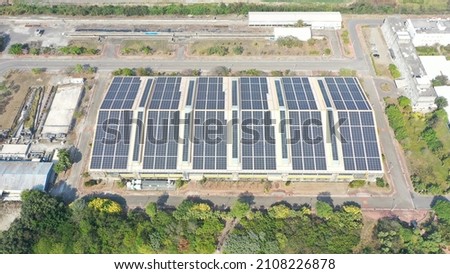 Modern factory building with roof mounted solar system
