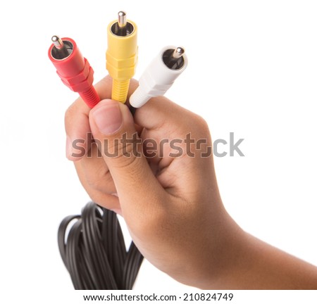 Female teenage hand holding audio and video cinch connector