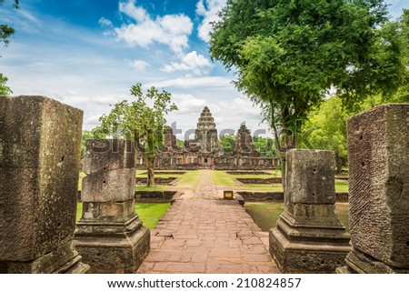 View of the historic Prasat Hin Phimai Castle at Nakhon Ratchasima Province, Thailand. The Khmer Castle were built during the Angkor period and marked the northern reaches of the realm. Royalty-Free Stock Photo #210824857