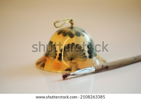 ceramic bell and brush, for decoration