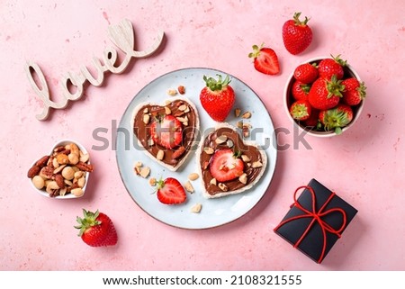 Breakfast for two, Valentines day food for couple in love with chocolate toasts and strawberry Royalty-Free Stock Photo #2108321555