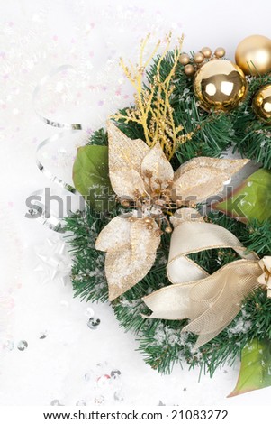 decorated christmas wreath on snow background