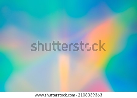 Multi colored background with holographic texture effect.