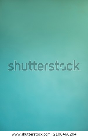 Close-up image of a textured aqua turqoise blue wall which can be used as a background. Royalty-Free Stock Photo #2108468204