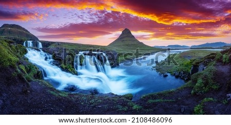 Gorgeous landscape with rising sun on Kirkjufellsfoss waterfall and Kirkjufell mountain, Iceland, Europe. Landscape photography
