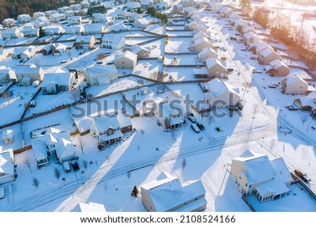 Wonderful winter scenery roof houses snowy covered aerial view with Boiling Springs small town snowy during a winter day after snowfall in South Carolina USA Royalty-Free Stock Photo #2108524166