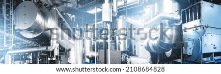 Modern industrial gas boiler room equiped for heating process with heating gas boilers, pipe lines, valves. Panoramic view, composed mixed media, collage. Blue toning. Royalty-Free Stock Photo #2108684828