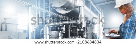 Engineer woman in working overalls with laptop inspect modern industrial gas boiler room. Heating gas boilers, pipelines, valves. Panoramic view, composed mixed media, collage Royalty-Free Stock Photo #2108684834