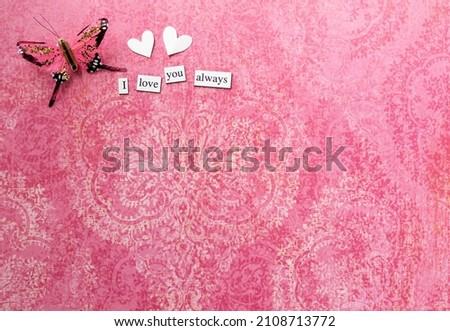 Valentines Day or wedding, invitation, butterfly and small cut white hearts, with words I Love you always, horizontal with copy space