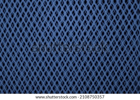 Abstract blurred blue and black grid background