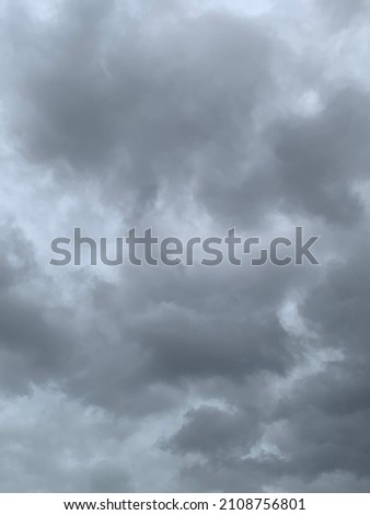 Dramatic landscape of stormy sky Nimbostratus Clouds A gray Style rolls and Huge scary storm it's going to rain heavily.no focus
