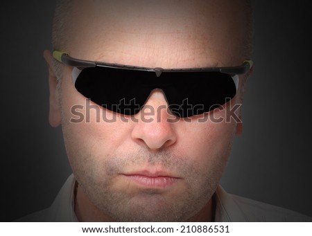 Portrait of man with sunglasses. Picture with space for your picture.