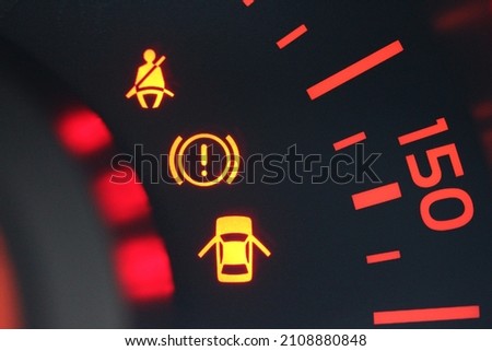 Various warning lamps in a new vehicle gauge cluster