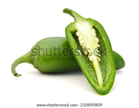 green chilies (jalapeno) on white background  Royalty-Free Stock Photo #210890809