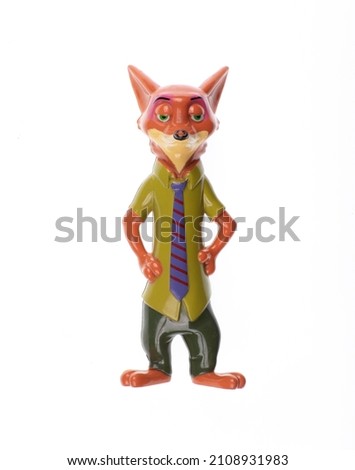 toy fox businessman isolated on white background