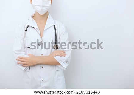 Doctor with stethoscope in medical coat on white background. Front position half body without head. Horizontal panoramic composition. Medical industry concept. Nurse in uniform healthcare concept.
