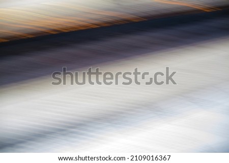 Modern abstract defocused blur background with light astrips