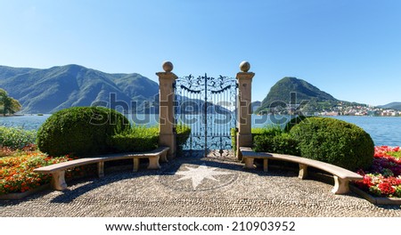 Lugano, Switzerland - Juli 31, 2014: Images of the Gulf of Lugano from Monte Bre above the City. Royalty-Free Stock Photo #210903952