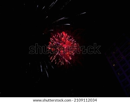 Fireworks in the clear sky at a high-rise house in the north of Thailand