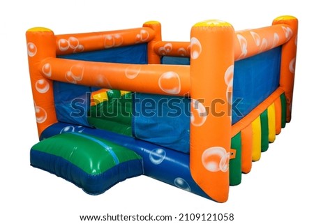 Rubber inflatable slide from an amusement park on white background isolated Royalty-Free Stock Photo #2109121058