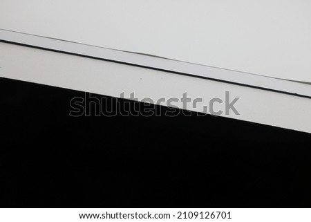 Lightbox for stock photos with black background. Objects are photographed using a light box. Sharp transitions from black to white