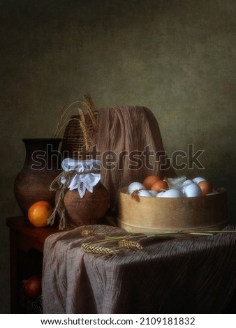 Rural still life with eggs and rue ears
