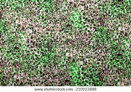 Green and brown leopard pattern. Animal print as background.