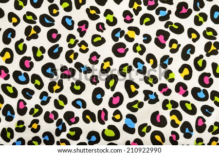 Colorful green, pink, blue, yellow leopard pattern. Animal print as background.