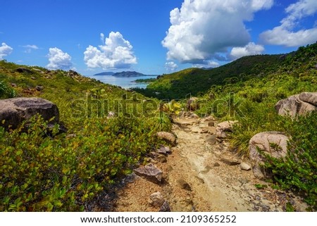 hikink in the jungle on curieuse island on the seychelles Royalty-Free Stock Photo #2109365252