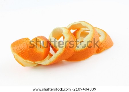 Spiral orange skin peel isolated on white background