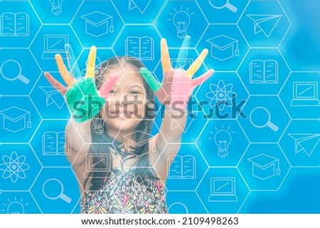 child with color paint on hand with icon of education imagine and idea concept