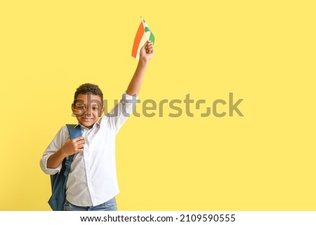 Pupil of language school with Hungarian flag on color background